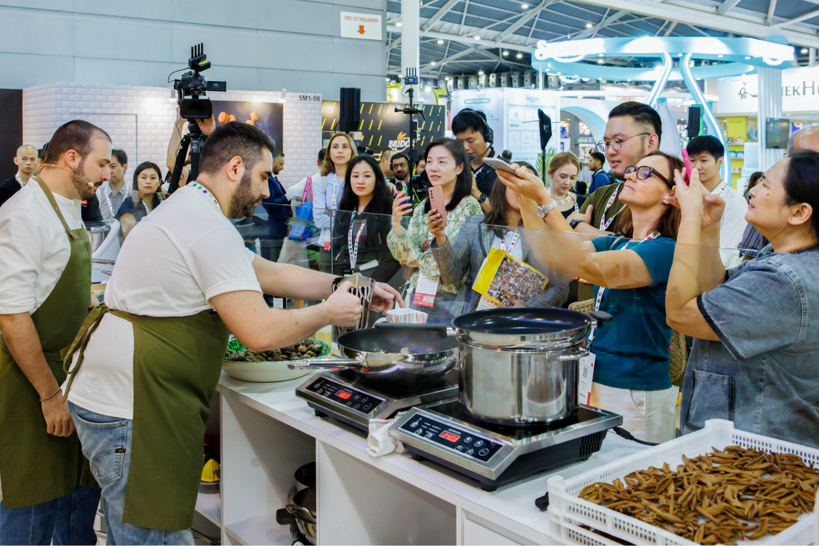 people-celebrating-at-anexpo=event-with-digital-equipments